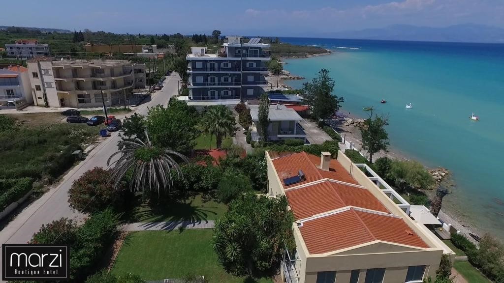 Marzi Boutique Hotel - Νεράντζα Κορινθίας ✦ -20% ✦ 2 Ημέρες (1 Διανυκτέρευση) ✦ 2 άτομα ✦ 8 ✦ 01/06/2024 έως 30/06/2024 και 01/09/2024 έως 30/09/2024 ✦ Δωρεάν ξαπλώστρες στην παραλία!